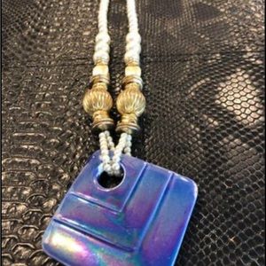 Pretty blue pendant with pearls